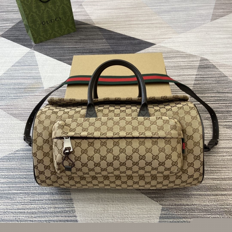 G*u*i top handle bags